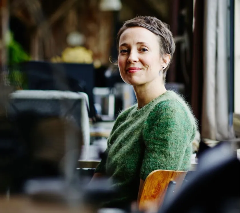A woman sitting at a table